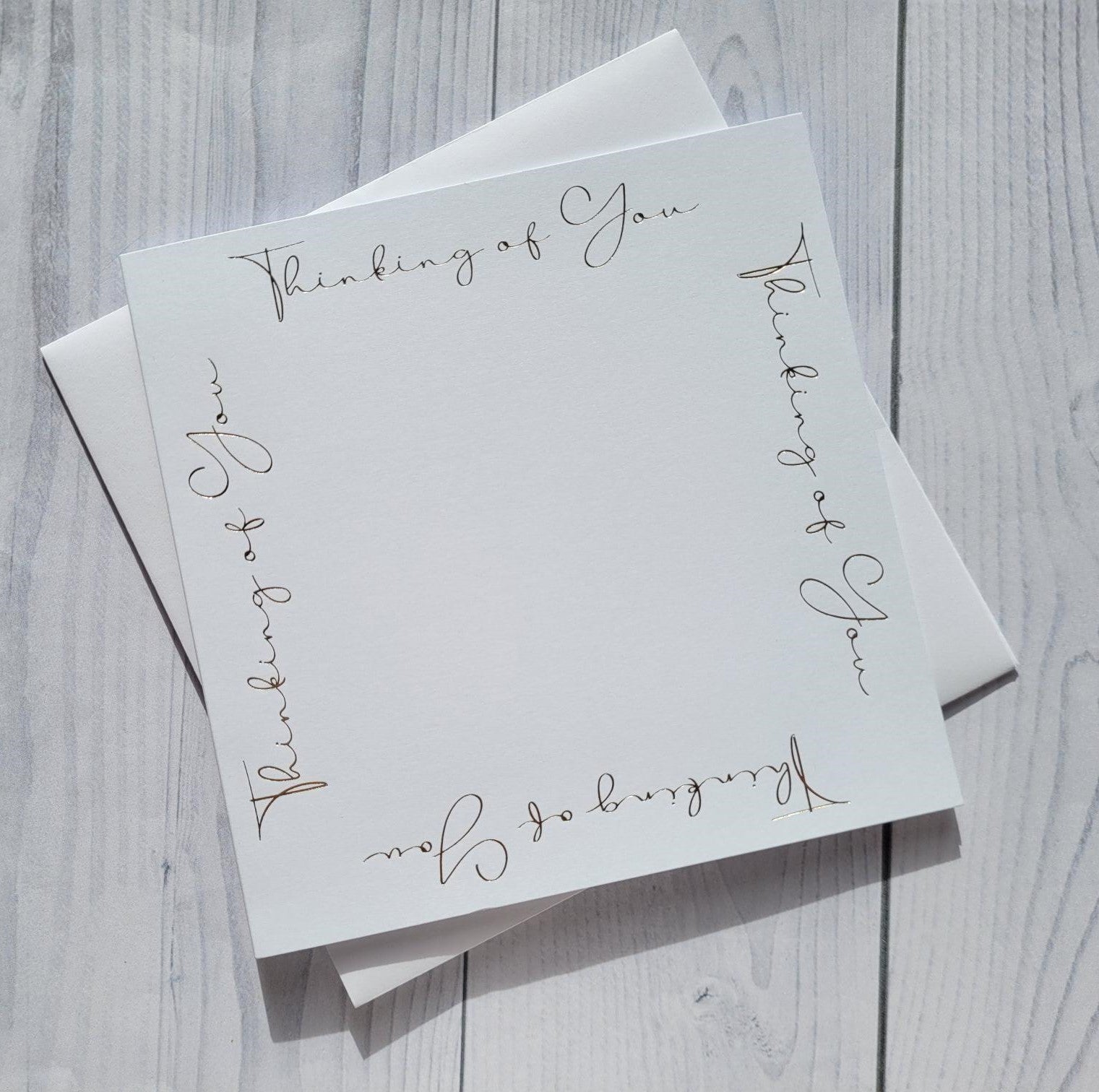 Card blanks and envelopes, 6" square hot foil printed "Thinking of You"