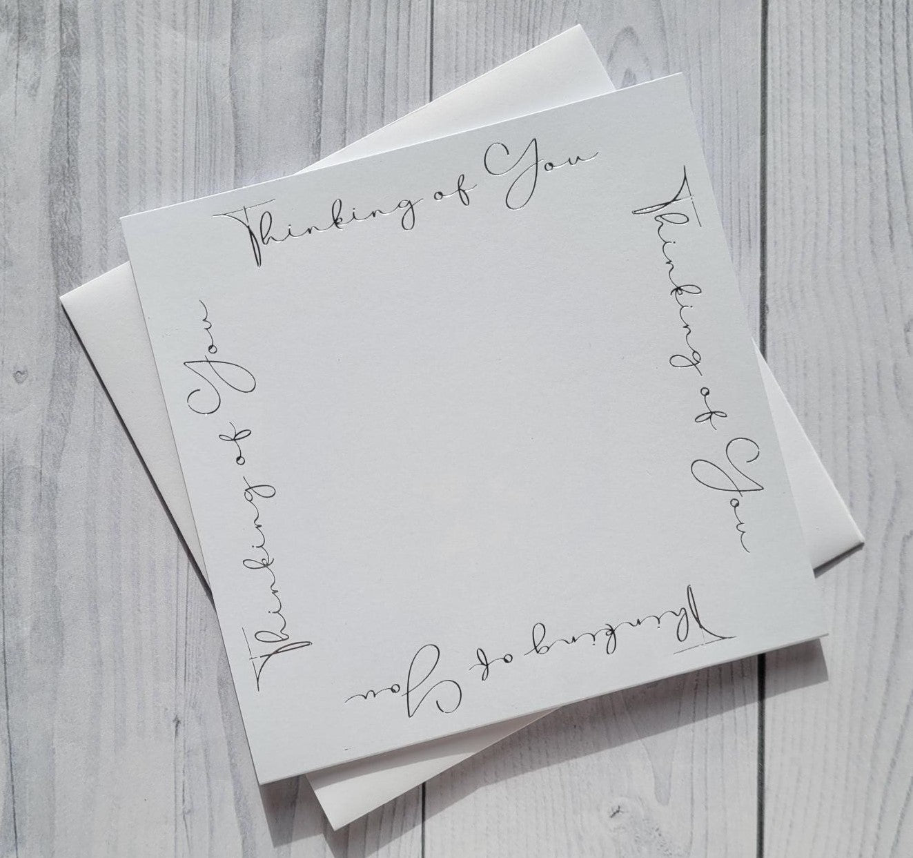 Card blanks and envelopes, 6" square hot foil printed "Thinking of You"